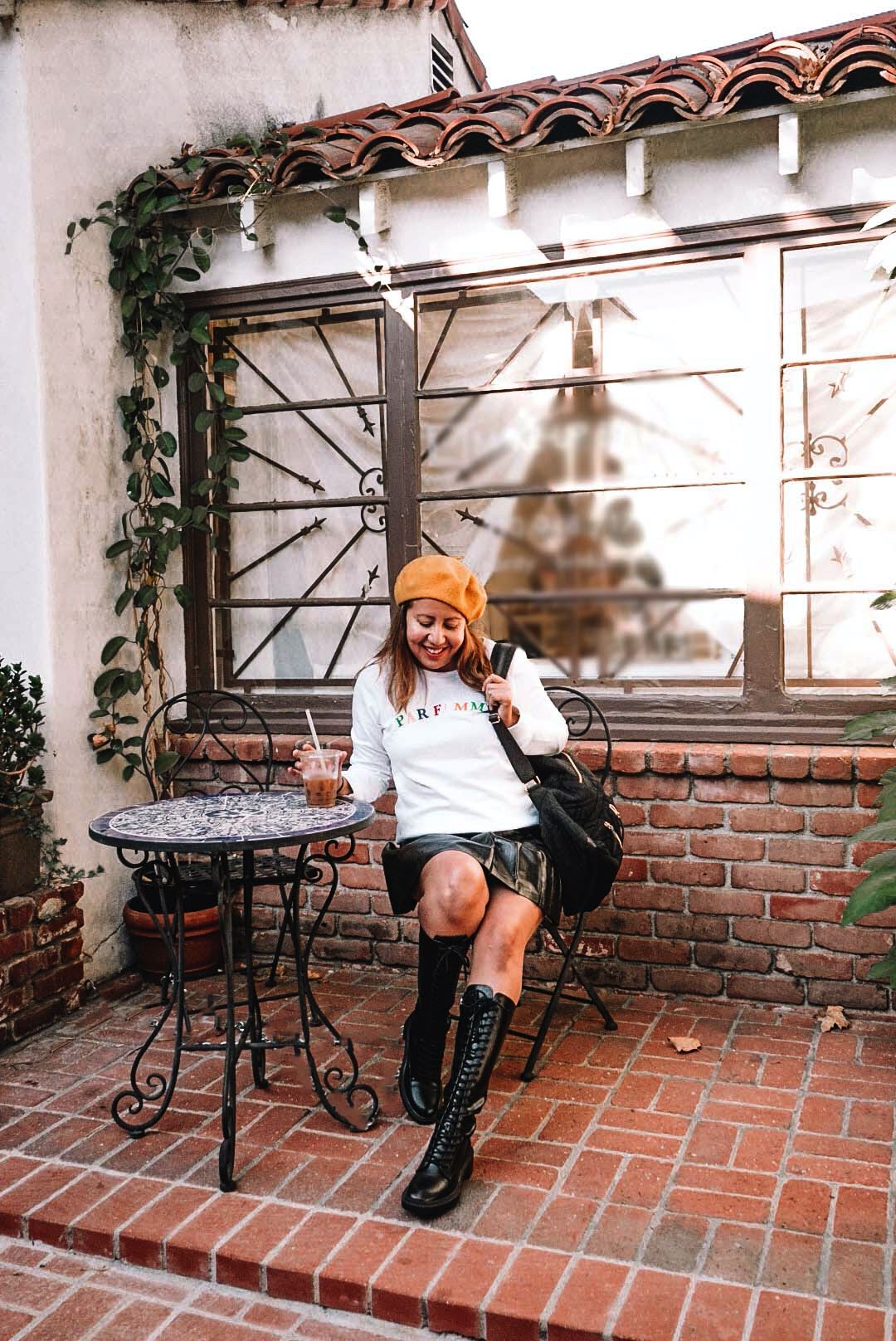 High combat boots and a Parisian style with yellow beret.