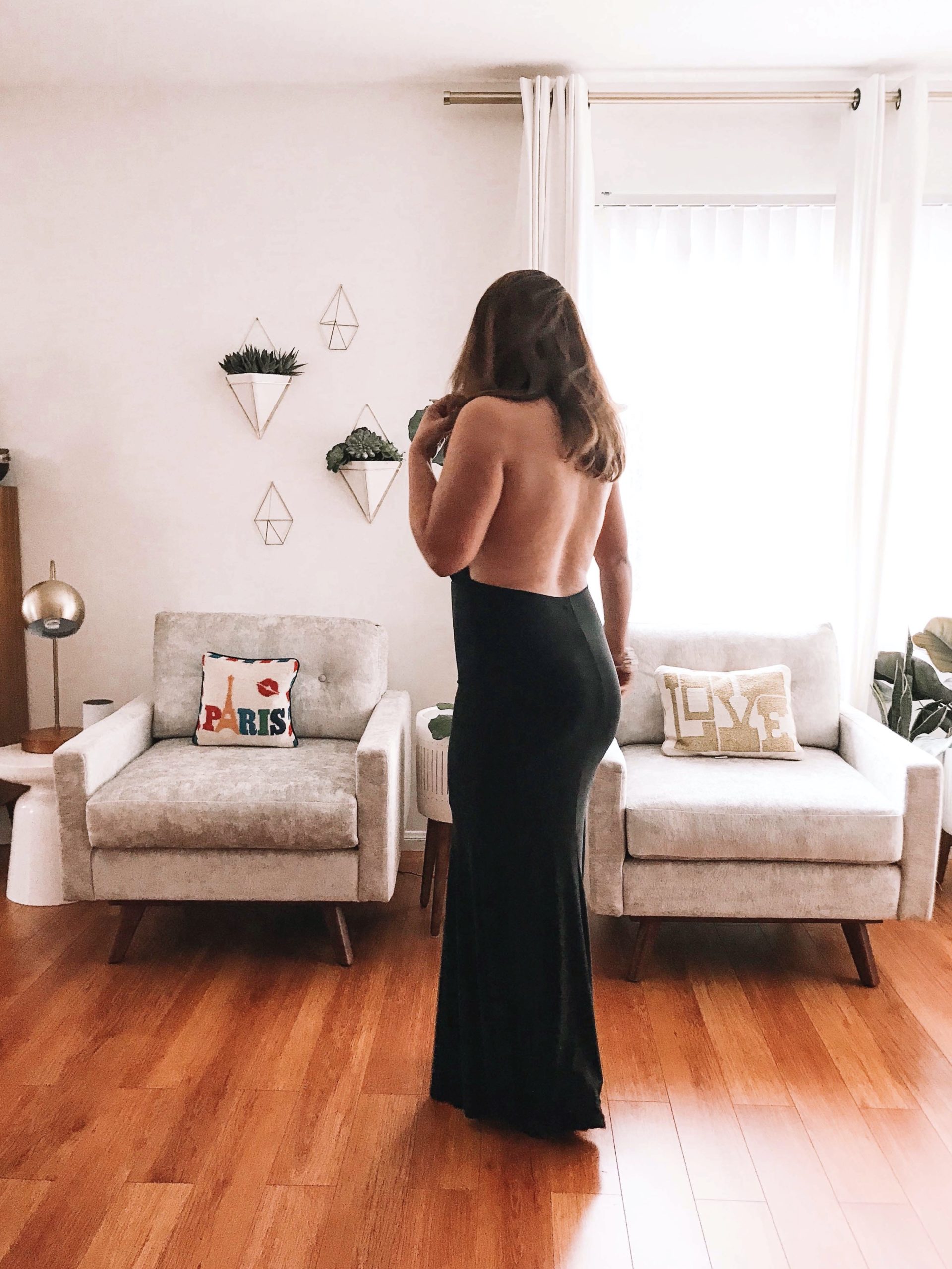A full open back on a black dress is so sexy.